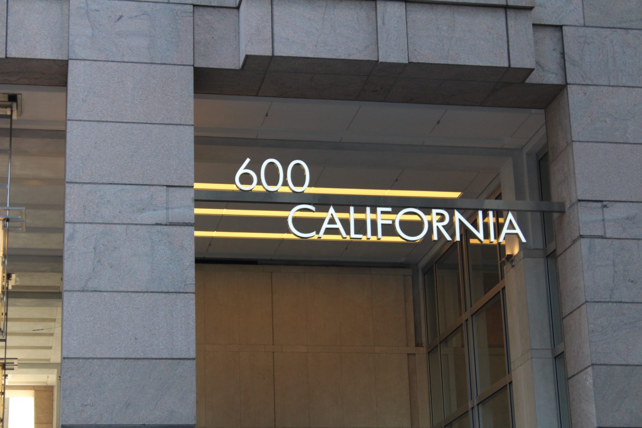 Dimensional address numbers mounted on a commercial building