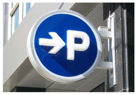 Projecting blade sign used for exterior wayfinding