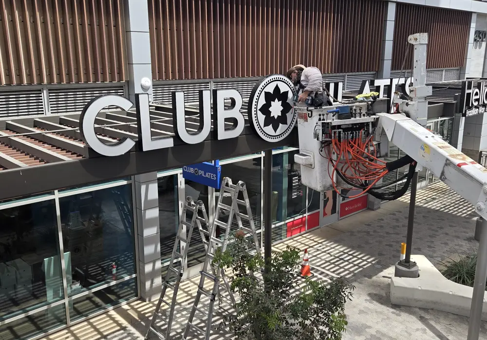 Custom dimensional building sign with branded lettering