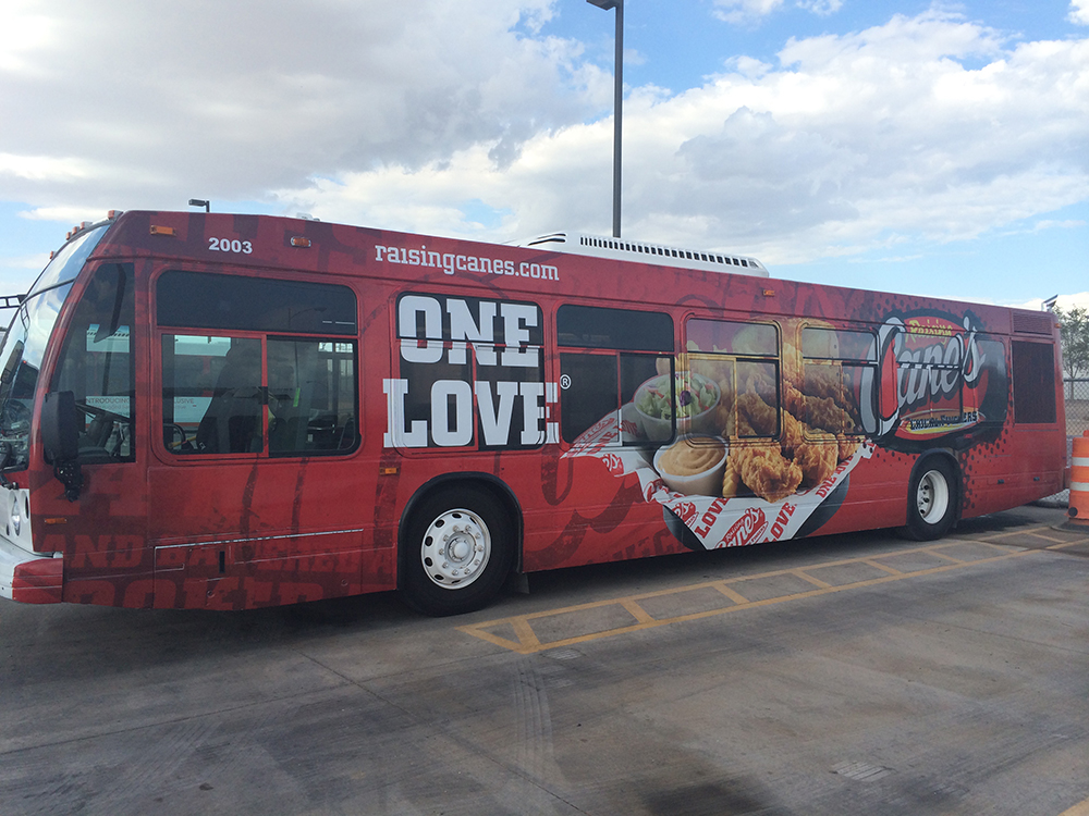 Colorful promotional advertising wrap on a bus