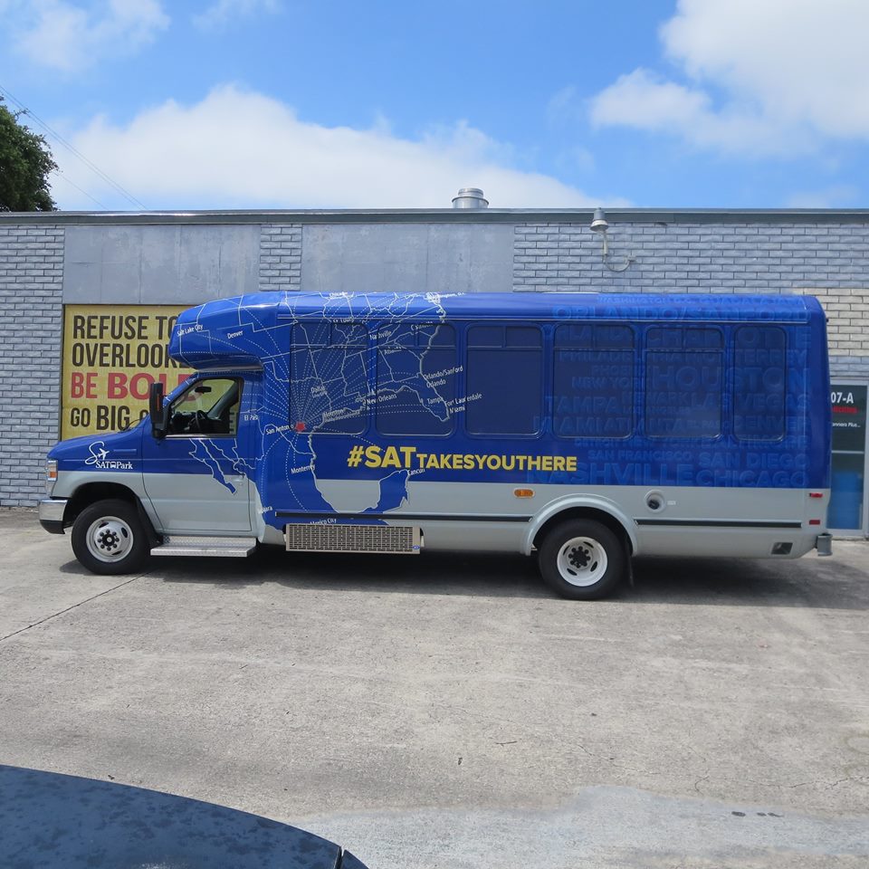 Professionally installed custom graphics on a shuttle bus