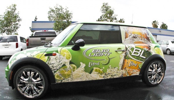 Custom full-color vinyl graphics fitted to a car