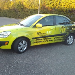 Partial car wrap with lettering example