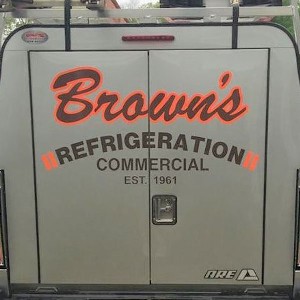 Commercial trailer with refrigeration service lettering