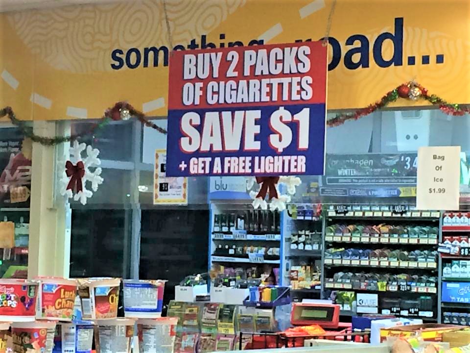 Promotional signage positioned near a checkout area