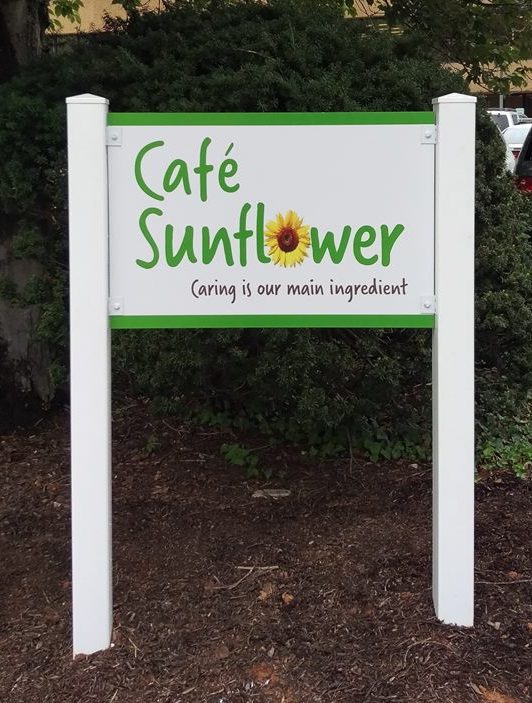 Branded post-and-panel property identification sign