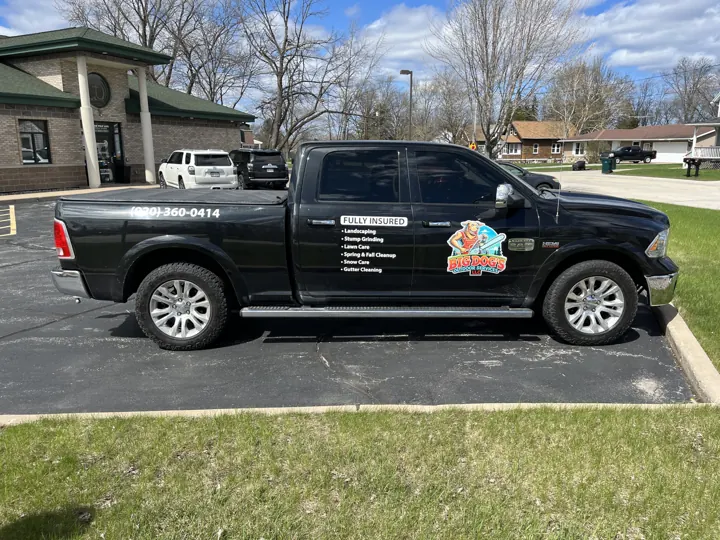 Big Dog’s Outdoor Service — truck graphics project by Covenant Signs and Graphics