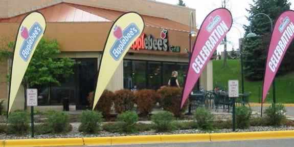 Custom feather flag used for an outdoor promotion