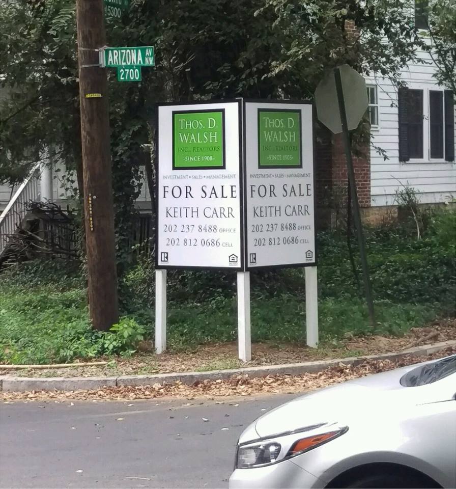 Custom post-and-panel real estate property sign