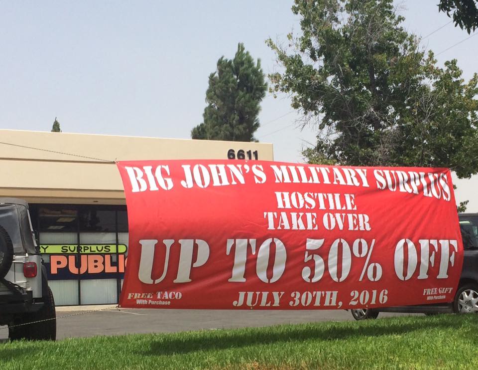 Outdoor promotional banner displayed by a retail store