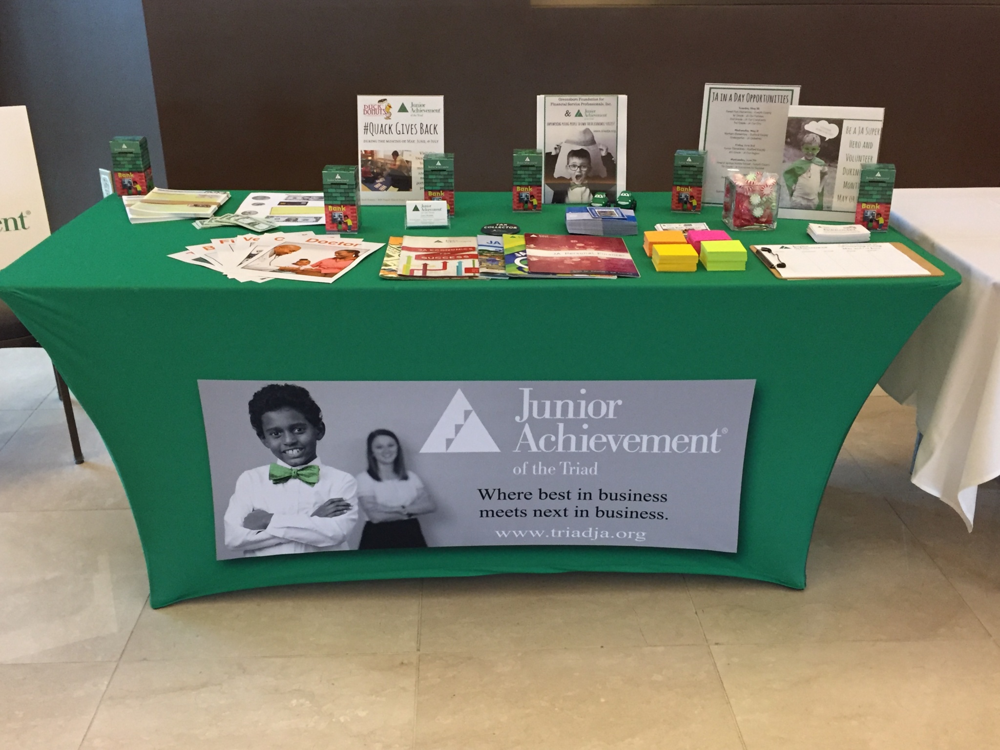 Custom printed event table cover at a community display