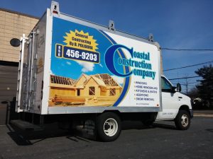 Custom wrap on a box trailer used by a service business