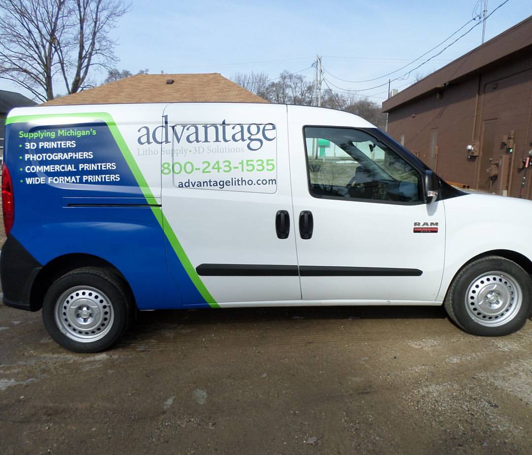 Custom vinyl graphics installed on a commercial work van