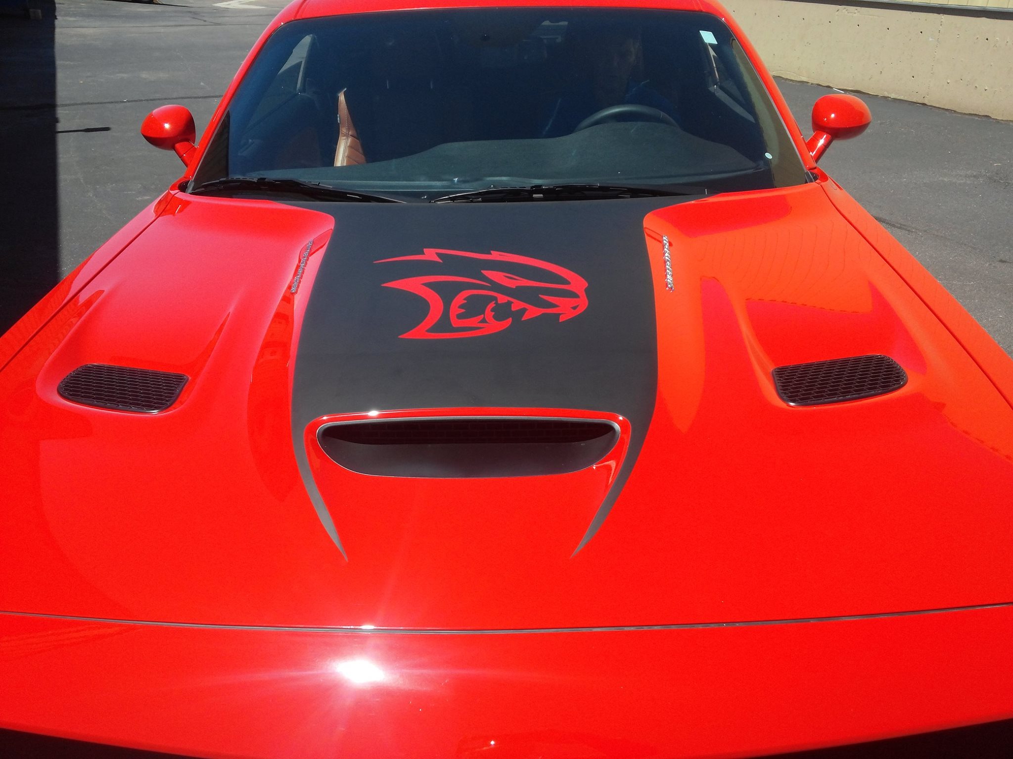 Custom spot graphics and logo decals on a vehicle