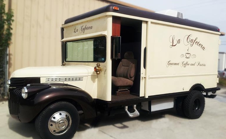 Promotional vinyl lettering on a branded food truck