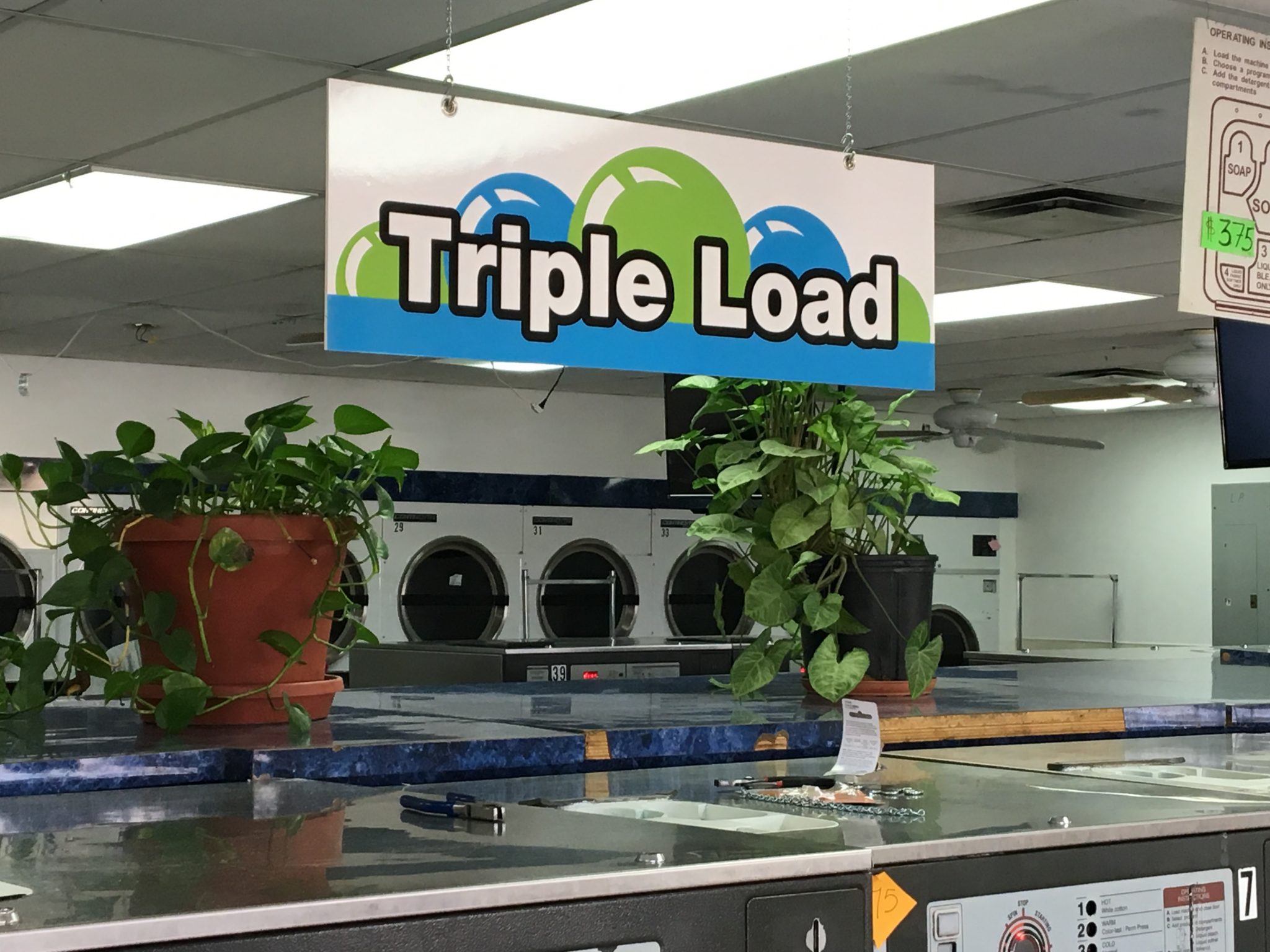 Large-format printed vinyl graphics produced for a custom sign project