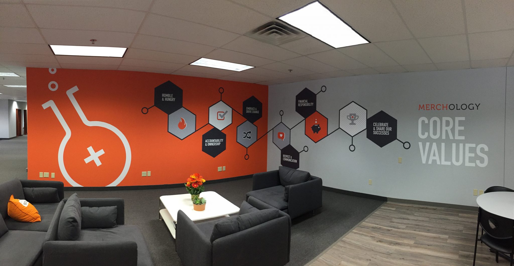 Retail interior enhanced with custom branded wall graphics